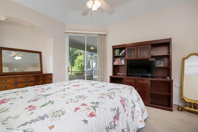 5249 Far Oak Cir, Sarasota, FL 34238 - bedroom with access to outside, light colored carpet, and ceiling fan
