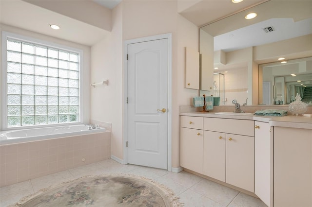 5249 Far Oak Cir, Sarasota, FL 34238 - bathroom with vanity, tile patterned flooring, a bath, a shower with shower door, and recessed lighting