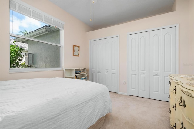 5249 Far Oak Cir, Sarasota, FL 34238 - bedroom with multiple closets and light carpet
