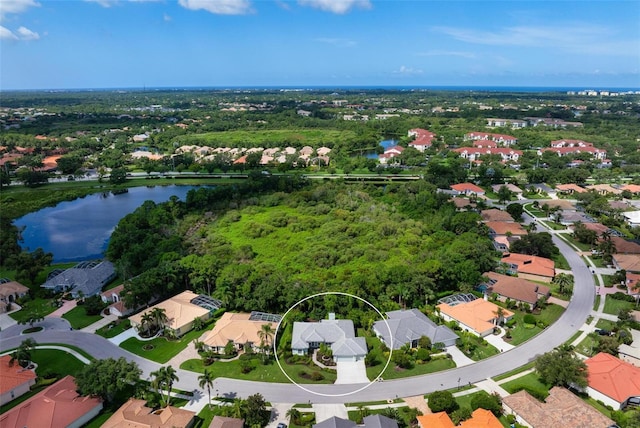 drone / aerial view with a water view