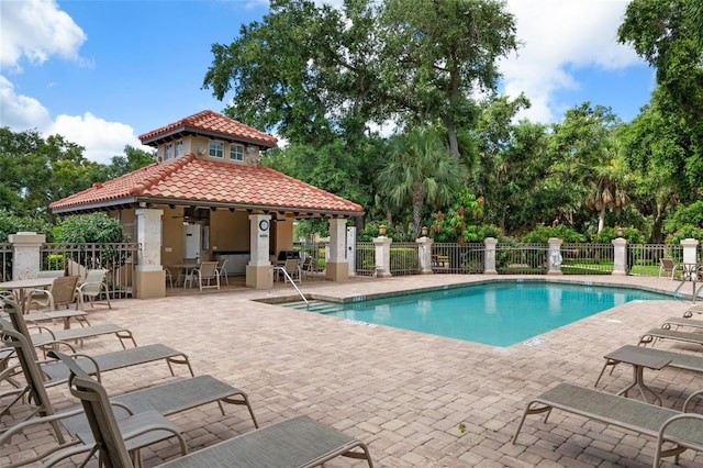 view of swimming pool featuring a patio