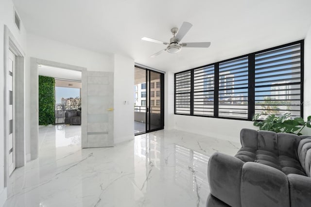 living room featuring ceiling fan