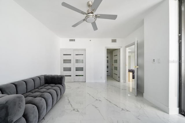 living room with ceiling fan