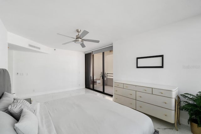 bedroom featuring a wall of windows and ceiling fan