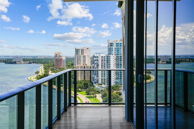 balcony featuring a water view