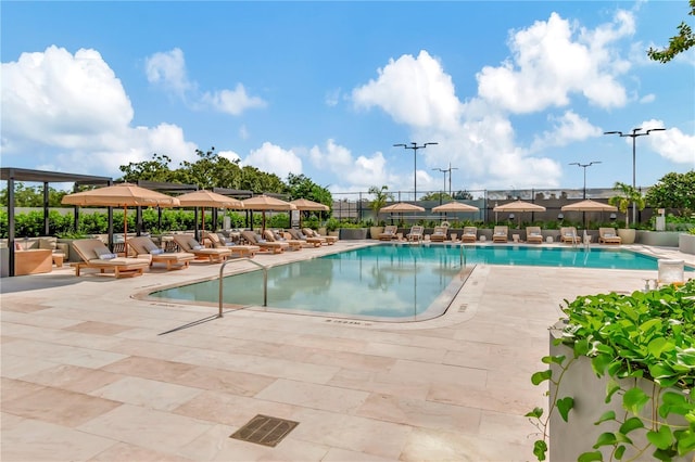 view of pool featuring a patio