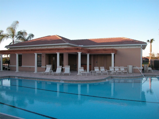 view of swimming pool featuring a patio