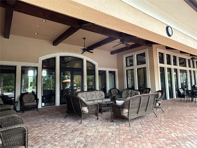 view of patio featuring outdoor lounge area and a ceiling fan