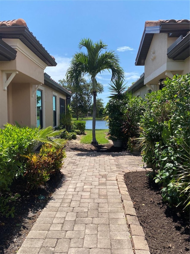 view of patio / terrace with a water view