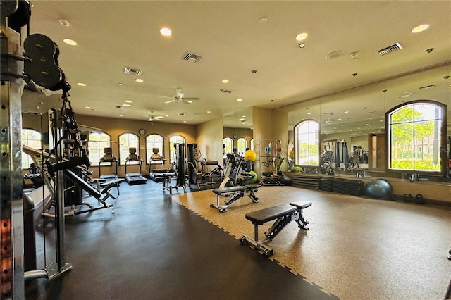 gym featuring recessed lighting and visible vents