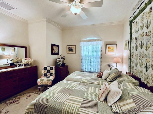 carpeted bedroom featuring a ceiling fan, visible vents, and crown molding