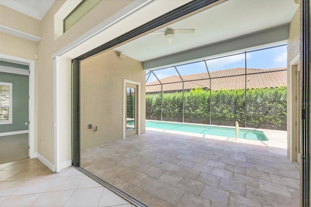 view of pool featuring ceiling fan and a patio area