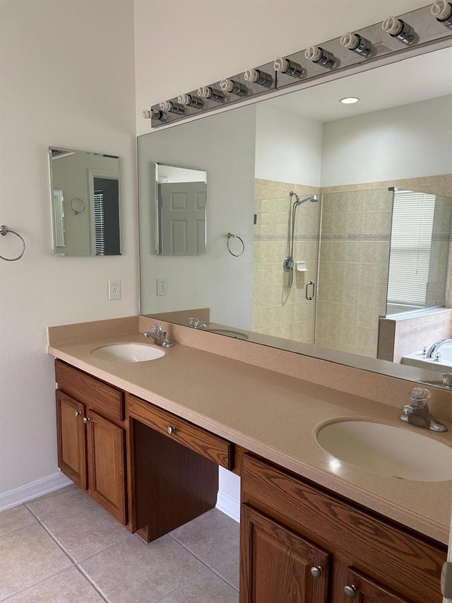 bathroom with independent shower and bath, tile patterned flooring, and vanity