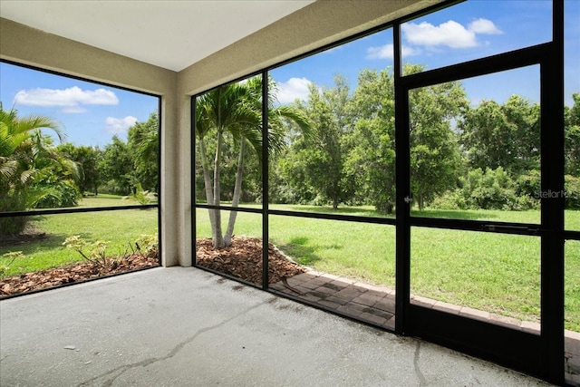 unfurnished sunroom with a wealth of natural light