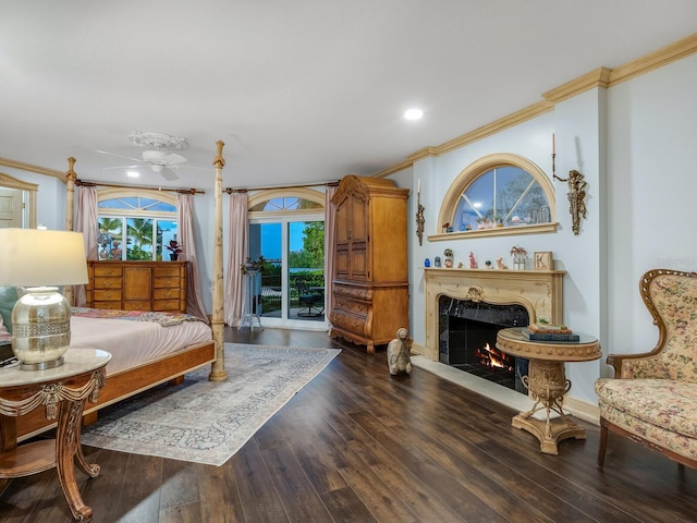 bedroom with crown molding and dark wood-type flooring