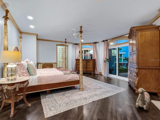 bedroom featuring crown molding and dark hardwood / wood-style floors