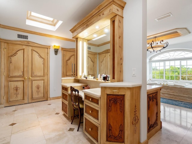 bathroom featuring a skylight, tile patterned floors, and crown molding