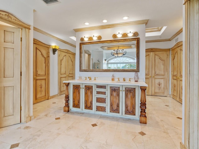 bathroom with vanity and ornamental molding