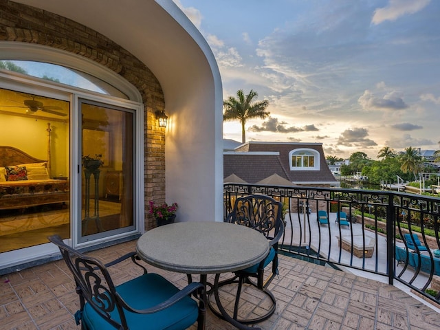 view of balcony at dusk