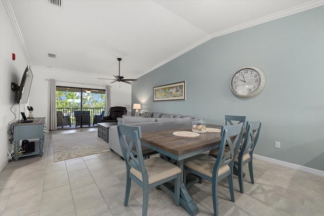 dining room with light tile patterned flooring, crown molding, ceiling fan, and vaulted ceiling