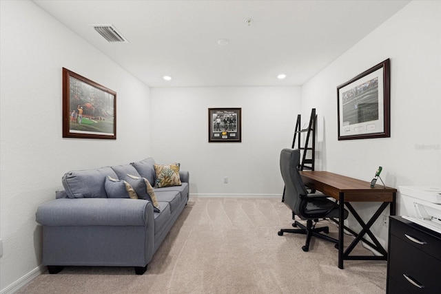 home office with light colored carpet