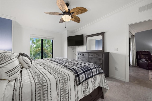 carpeted bedroom with lofted ceiling, ceiling fan, and crown molding