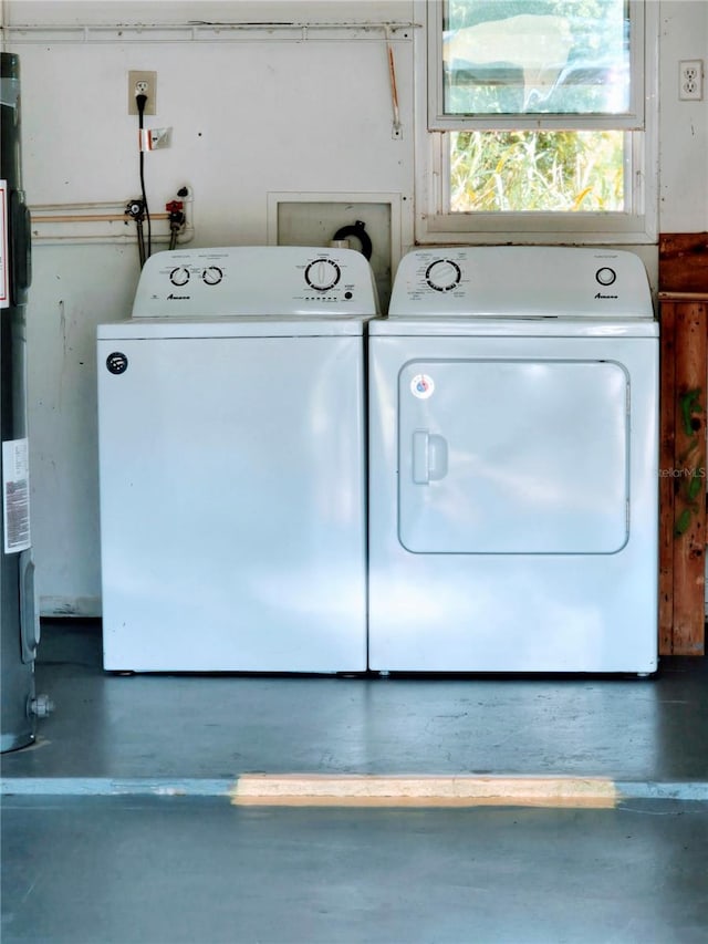 clothes washing area featuring washing machine and dryer