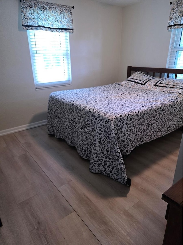 bedroom featuring hardwood / wood-style flooring