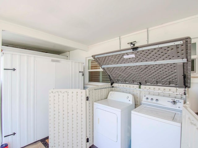 laundry area with washer and clothes dryer