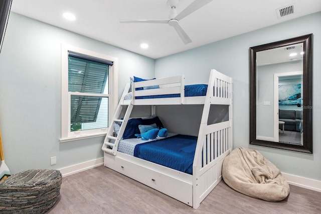 bedroom featuring wood-type flooring and ceiling fan