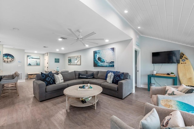 living room with lofted ceiling, wood ceiling, light hardwood / wood-style flooring, and ceiling fan