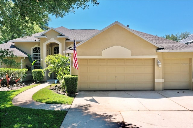 single story home with a garage