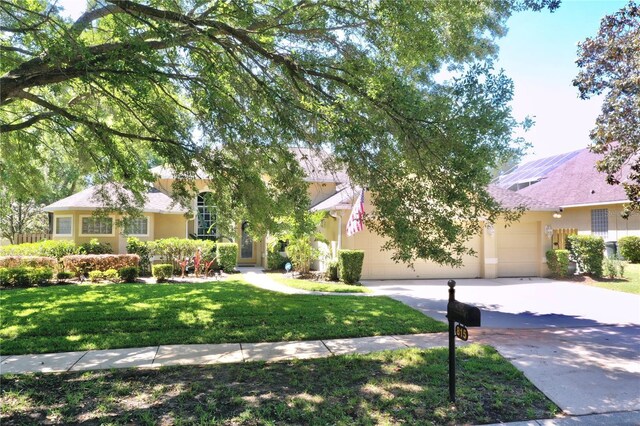 view of front of home with a front lawn