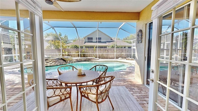 view of pool with a lanai and a patio