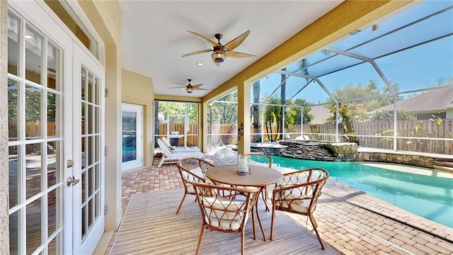 sunroom with a swimming pool