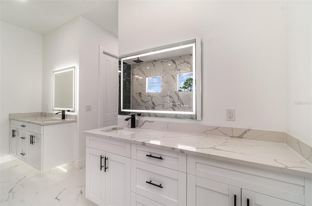 bathroom with vanity and tile patterned flooring