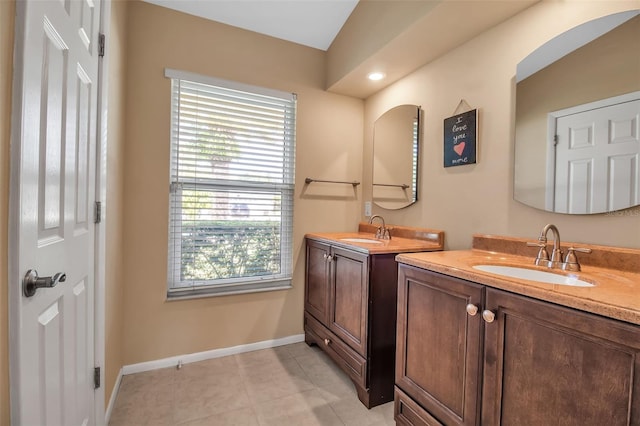 bathroom featuring vanity and tile patterned flooring