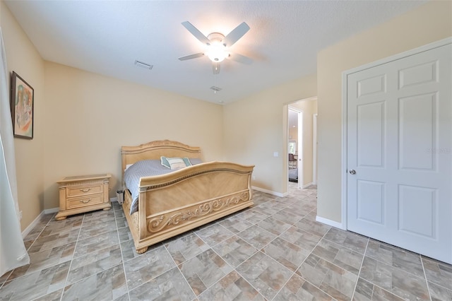 bedroom featuring ceiling fan