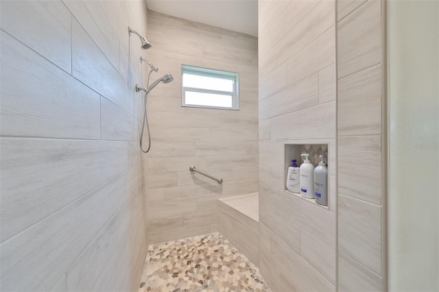 full bathroom featuring a tile shower