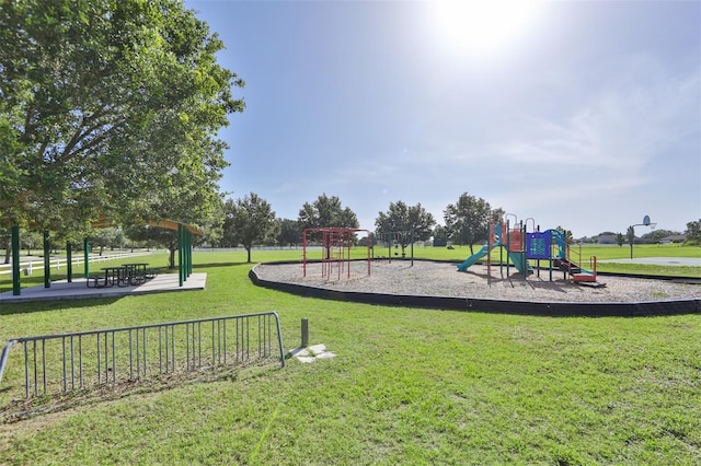 community playground featuring a yard
