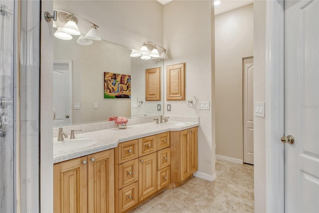 bathroom featuring tile patterned floors and dual bowl vanity