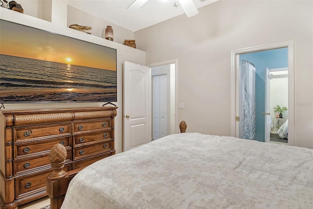 bedroom with vaulted ceiling and ceiling fan