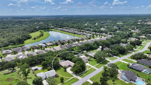 bird's eye view with a water view