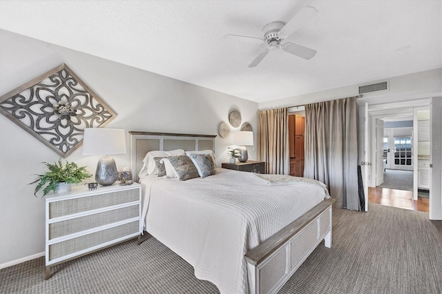 carpeted bedroom featuring ceiling fan