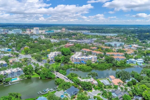 birds eye view of property featuring a water view