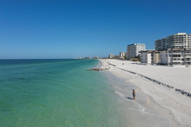 view of water feature with a beach view