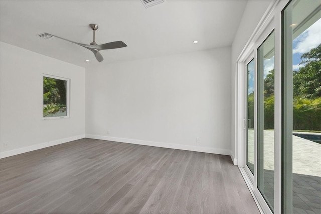 unfurnished room featuring wood-type flooring and ceiling fan