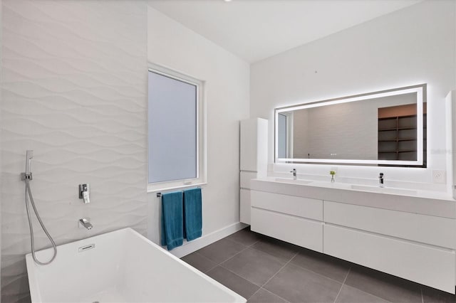 bathroom featuring independent shower and bath, vanity, and tile patterned floors