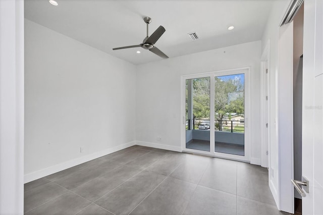 unfurnished room with ceiling fan