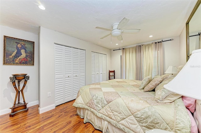 bedroom featuring ceiling fan and light wood-type flooring